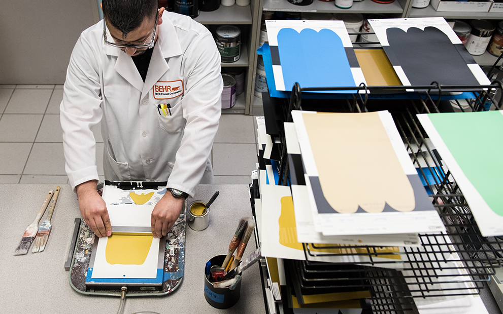 A Behr Chemist making a color drawdown