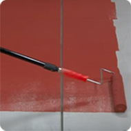 Image of a concrete floor being stained with Solid Color Concrete Stain