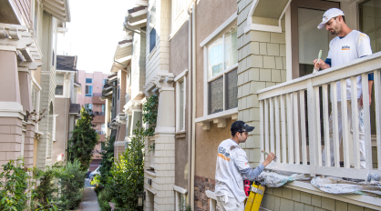Pro Painters painting a multi-family building