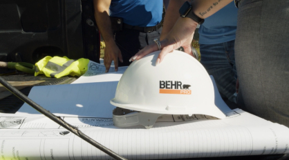 Team reviewing site drawings