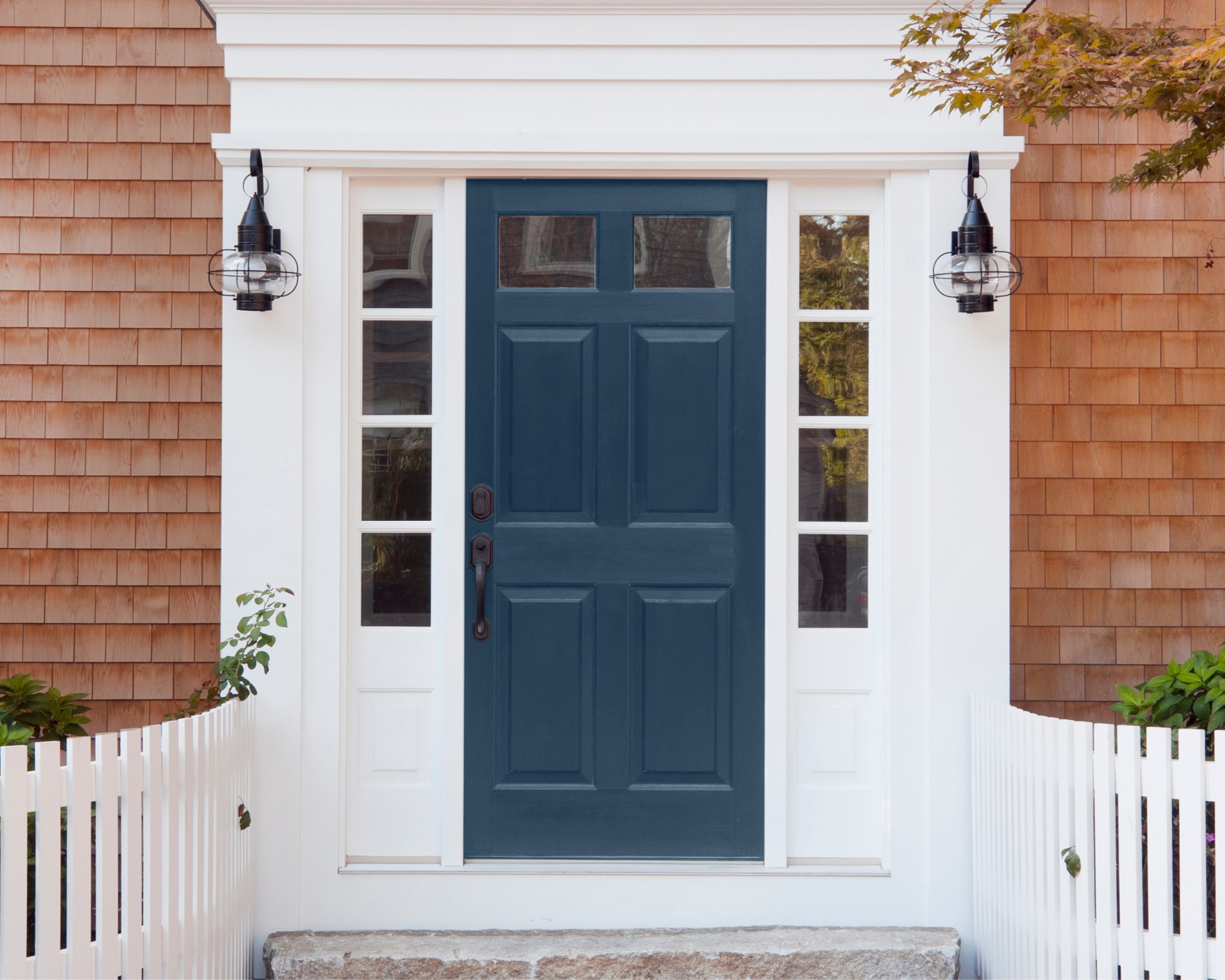 Front door featuring Behr color Compass Blue