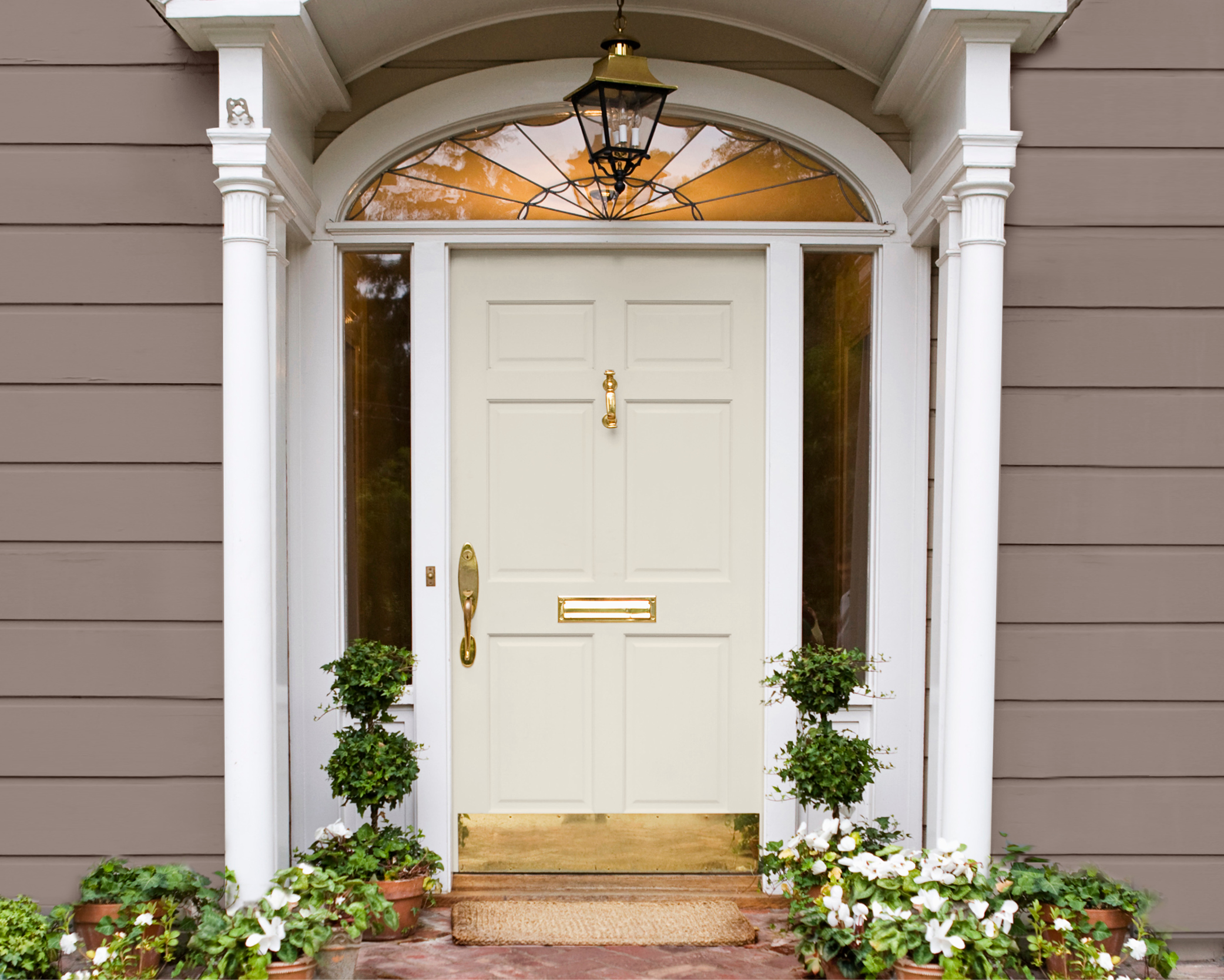 Front door featuring Behr color Swiss Coffee