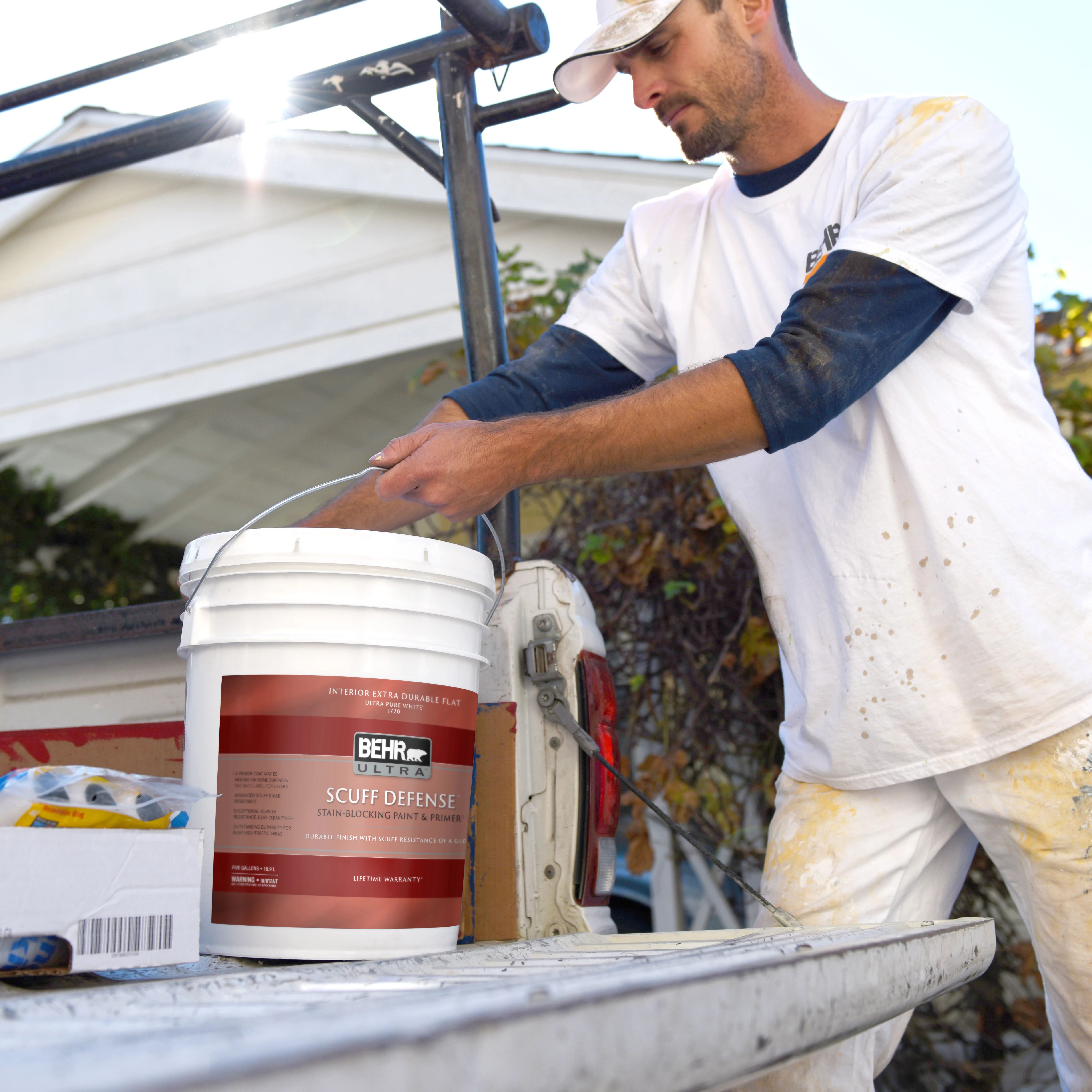 Pro painter using BEHR ULTRA® SCUFF DEFENSE™ INTERIOR PAINT