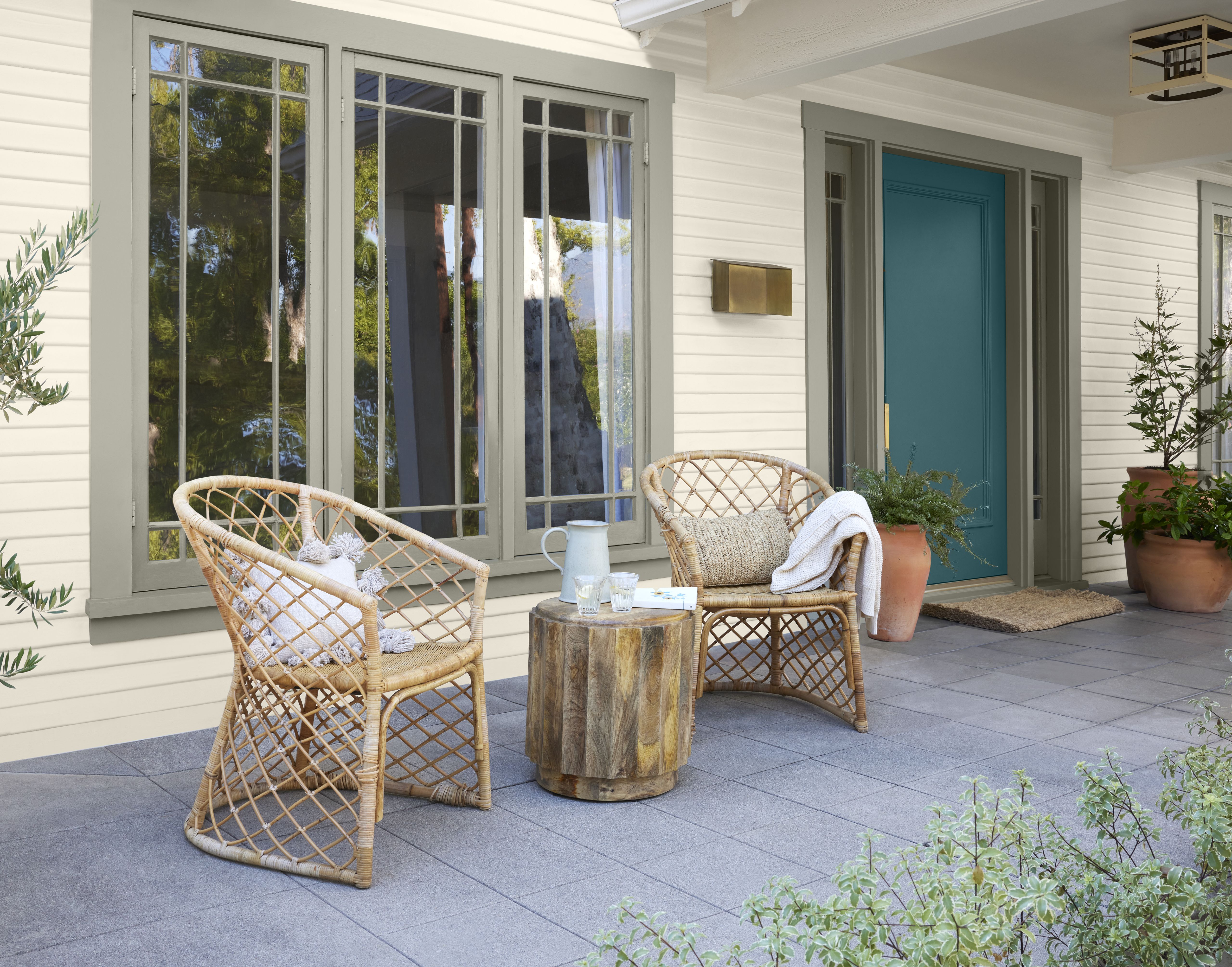 Front door featuring BEHR Sophisticated Teal Paint Color