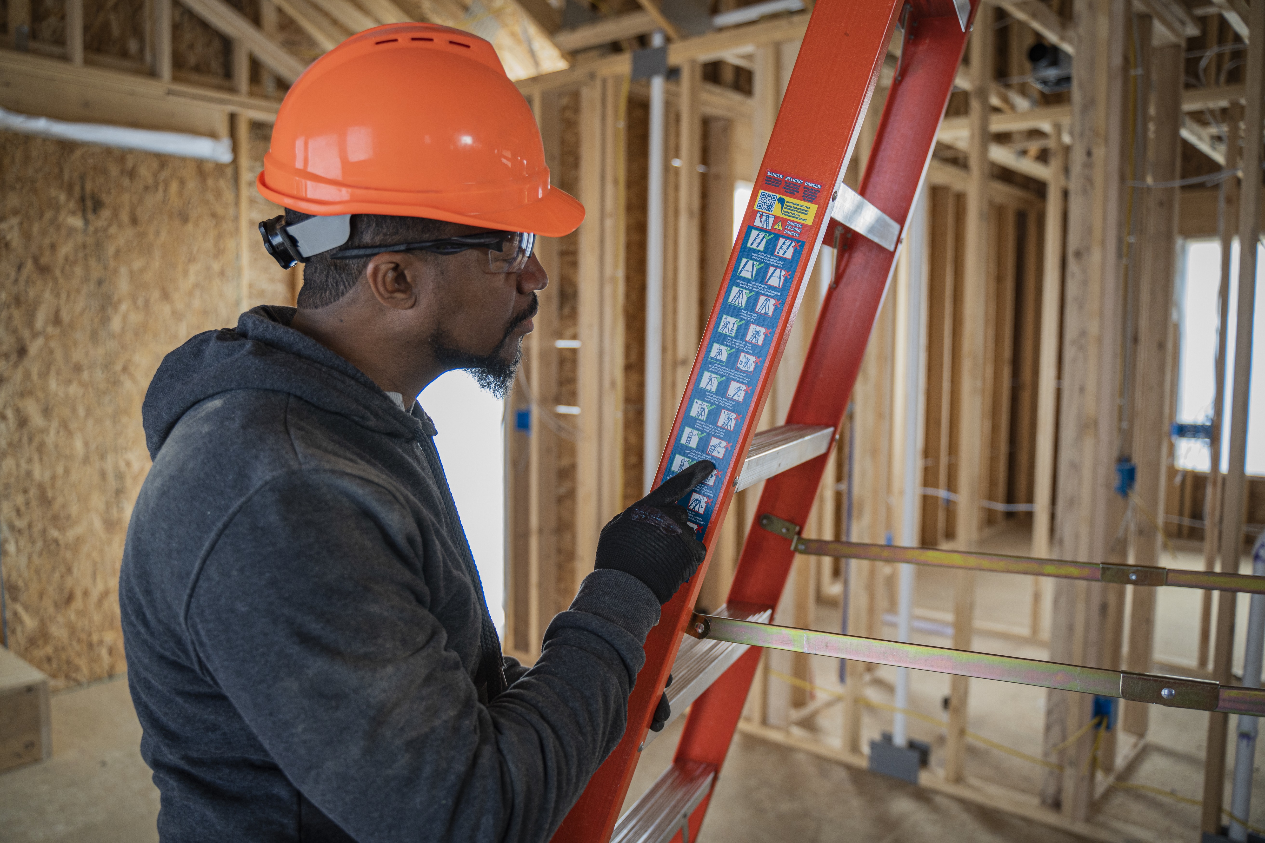 Male Reviewing Ladder