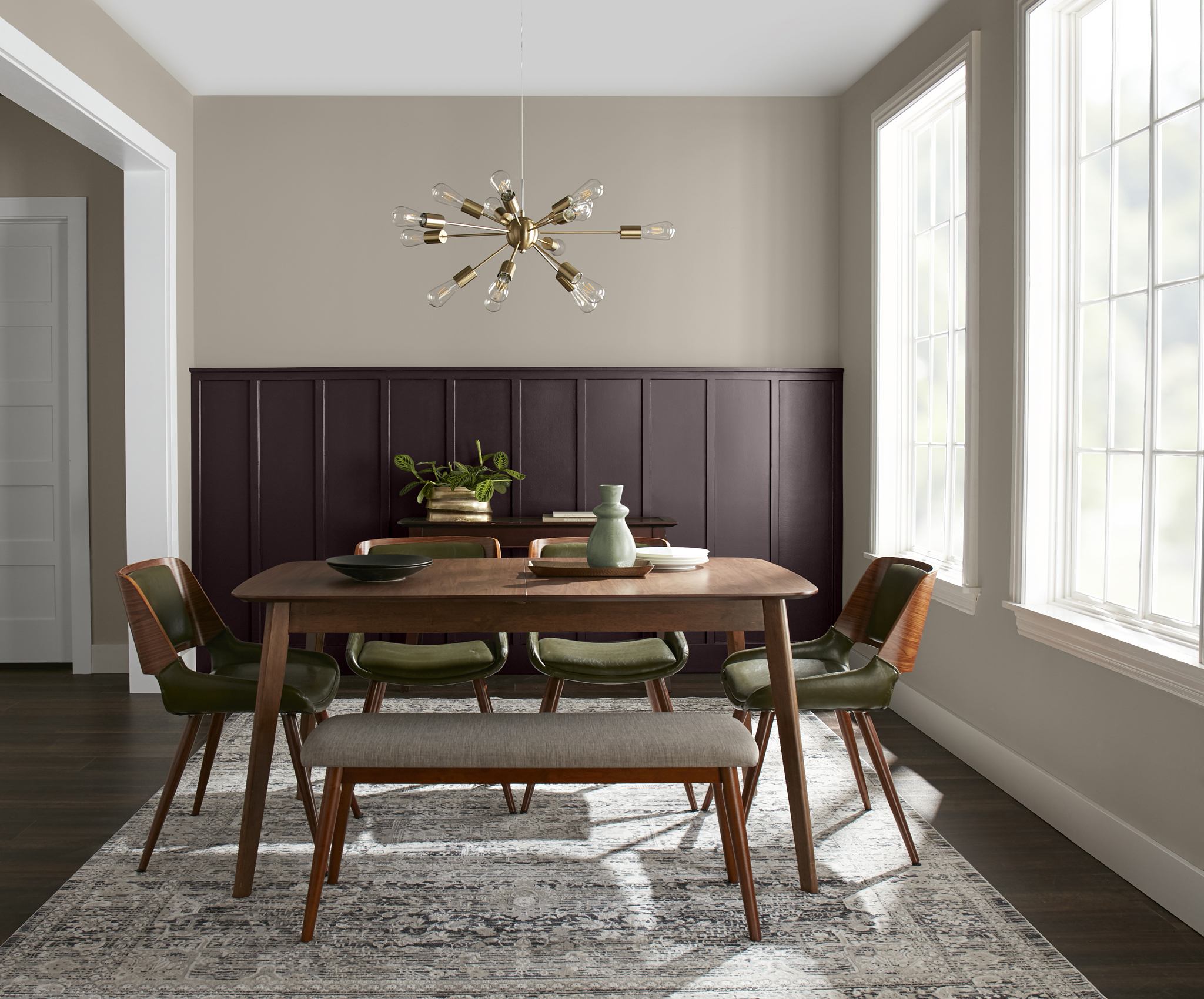 RESIDENTIAL SPACE WITH UPPER WALL ABOVE CHAIR RAIL PAINTED A MATTE FINISH AND THE LOWER WALL IS A HIGHER SHEEN