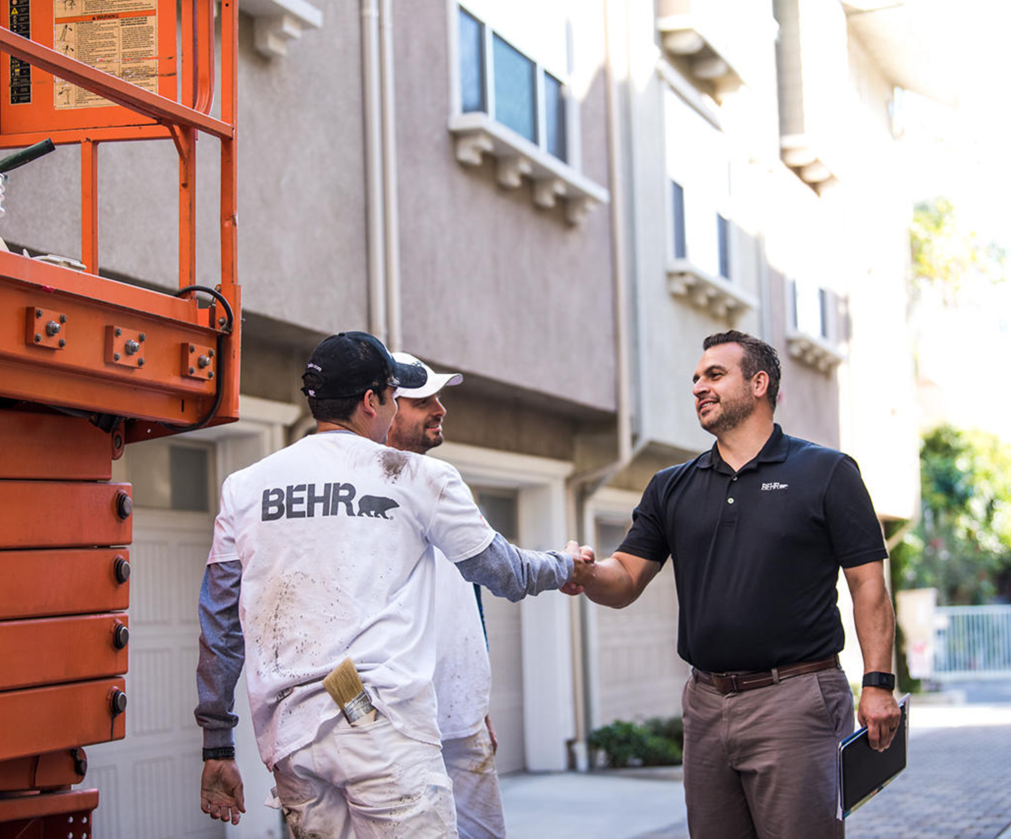 COMMERCIAL PAINTER WITH BEHR PRO REP AT MULTIFAMILY JOBSITE